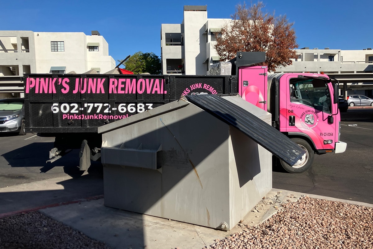 Pinks Junk Removal crew clearing commercial site