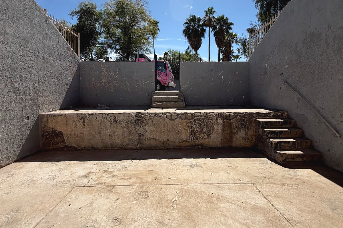Cleared courtyard after junk removal